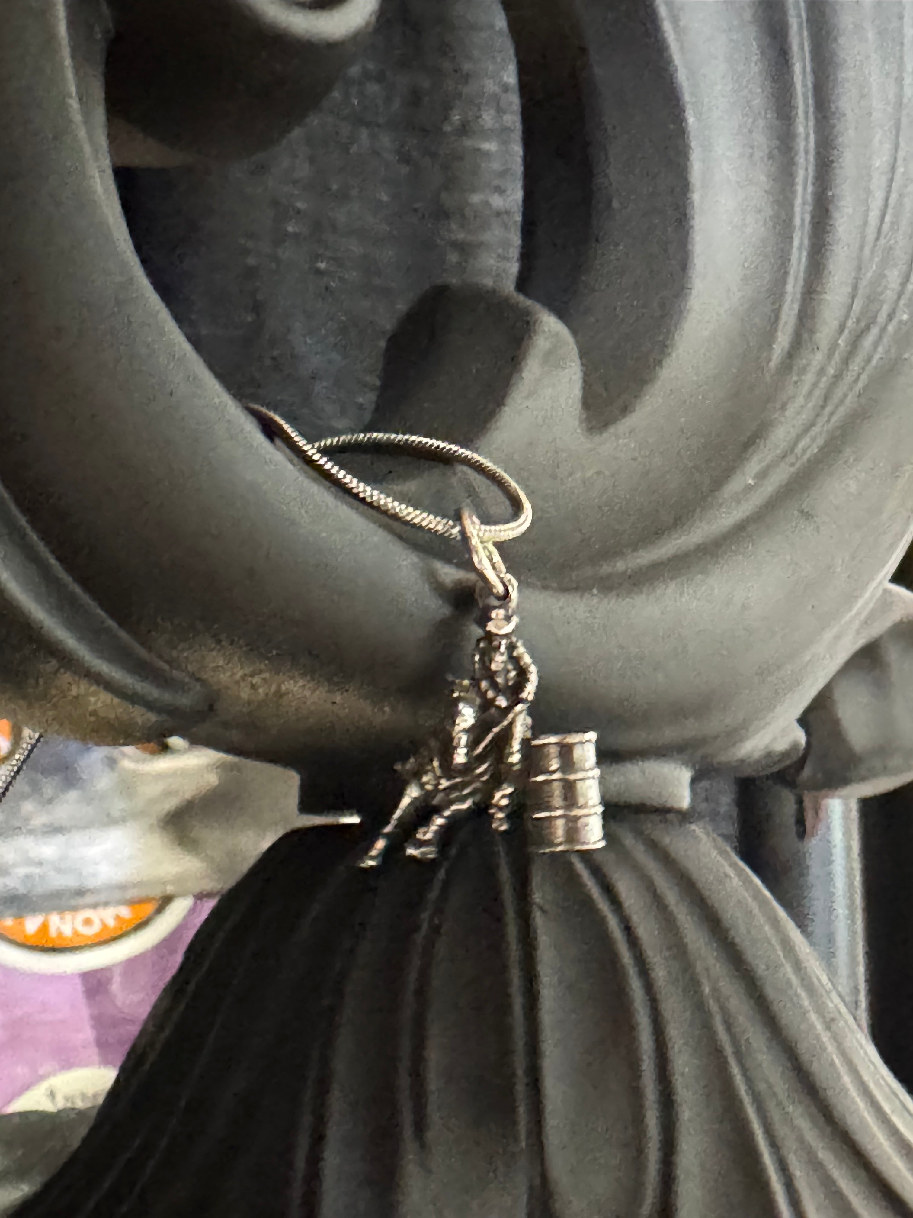 Barrel racer pendant, chain included.