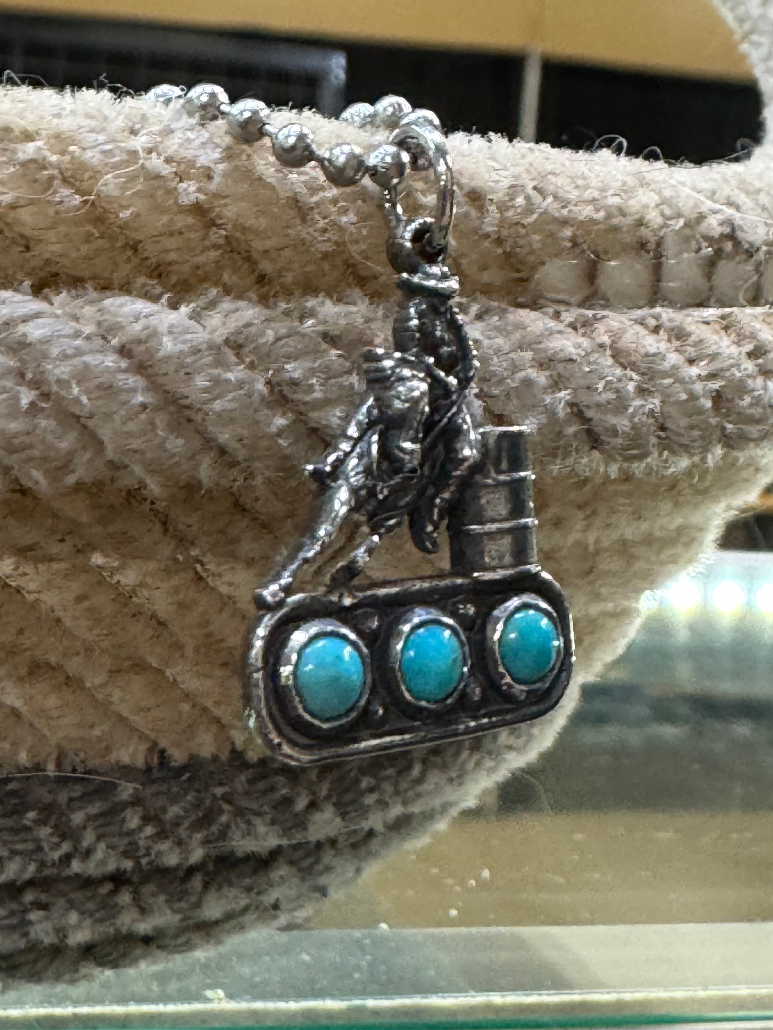 Barrel racer on 3 turquoise